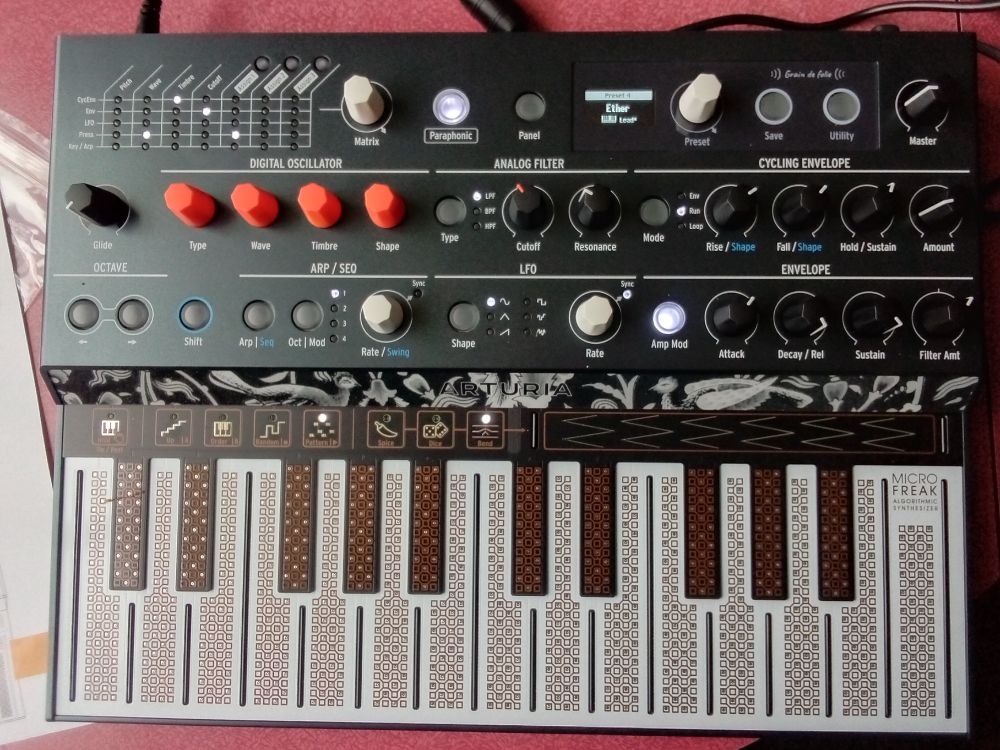 Synth. 2 octave keyboard. Lots of knobs/buttons.