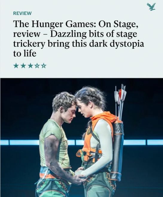 Screencap of a headline and image from The Independent for a review of The Hunger Games: On Stage: 'dazzling bits of stage trickery bring this dark dystopia to life, 3/5 stars'