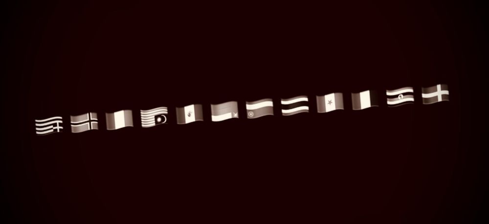 National flags. A string of eleven of them. Upside down. And greyscaled. Again, impossible to say which flags. Although it isn't a particularly easy puzzle even if one knew. 