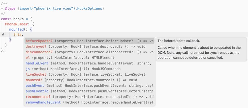An editor window with a LiveView hooks object declaration:

const hooks = {
  PhoneNumber: {
    mounted() {
      this.
    }
  }
}

The cursor position is currently after the dot of `this.` and the editor is suggesting all the available hook properties and methods like `beforeUpdate`, which is currently selected and shows a description of the beforeUpdate method on the right.