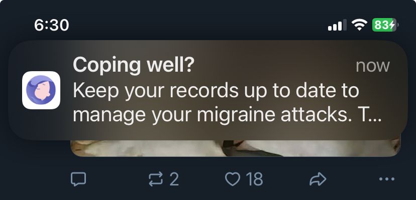 A push notification that says “Coping well? Keep your records up to date to manage your migraine attacks.”
