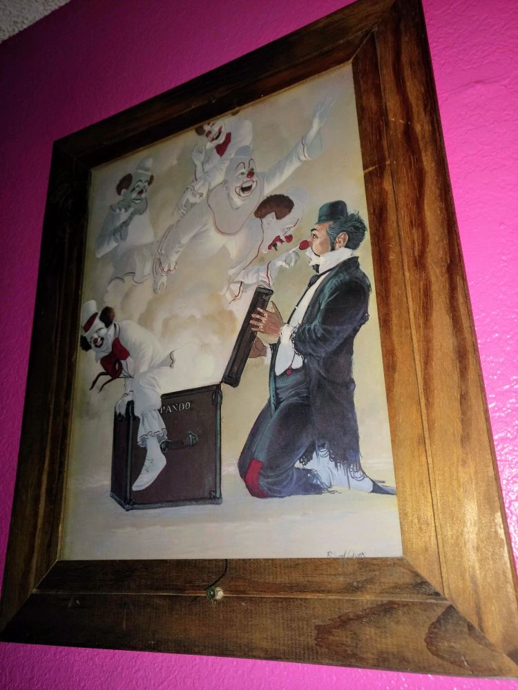 A painting of clowns escaping from a box, while the clown opening the box looks surprised.