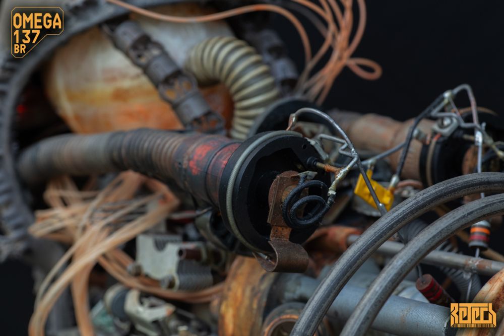 A closeup detail shot of the biomech sculptur featuring a host of fiddly bits from various mechanical and electrical devices.