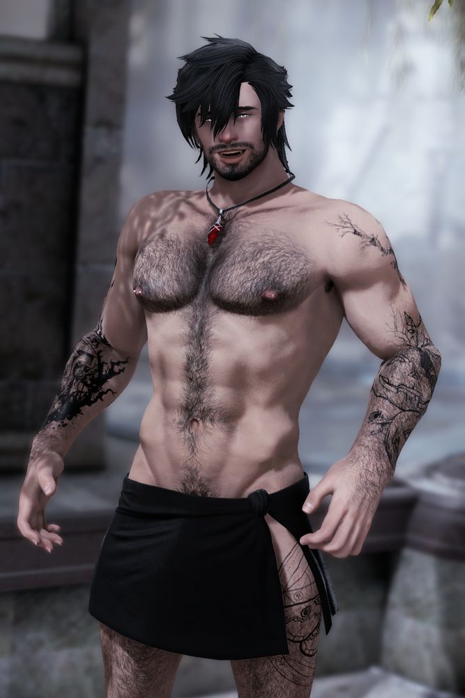 Avy wearing nothing but a skimpy black towel, showing major bulge underneath as he looks on with an embarrassed face.