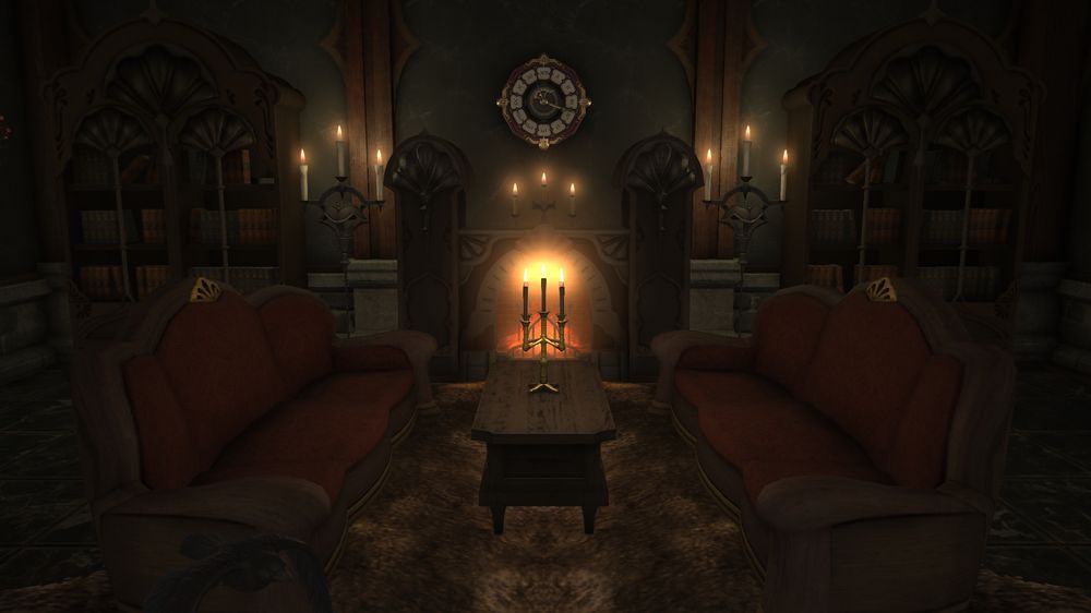 avy's living room includes a bearskin rug beneath a candelabra adorned sitting table, two opposing rust red sofas, and a majestic fireplace beyond those. it is flanked by two floor length candelabras and two regal bookcases.