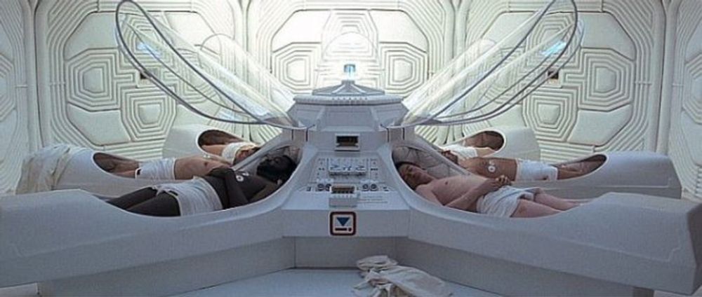 A group of space truckers emerge from their hibernation pods in the 1977 sci-fi horror film ‘Alien’