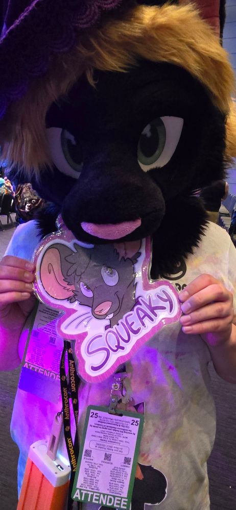 me with my fursuit head eating squeaky's cute face
