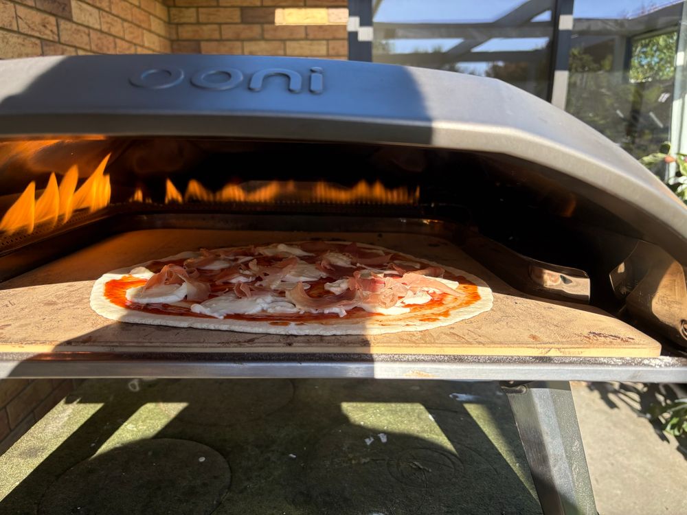 Pizza cooking in the oven.