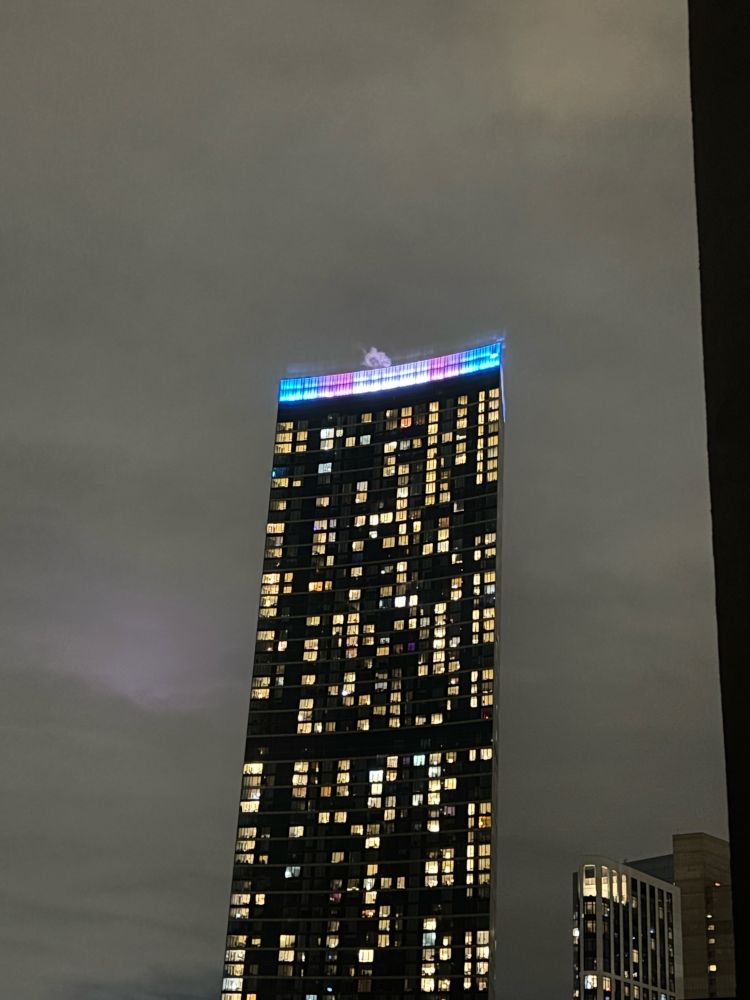 A building on Long Island sports a Transgender Pride Flag for the evening on November 20, 2024