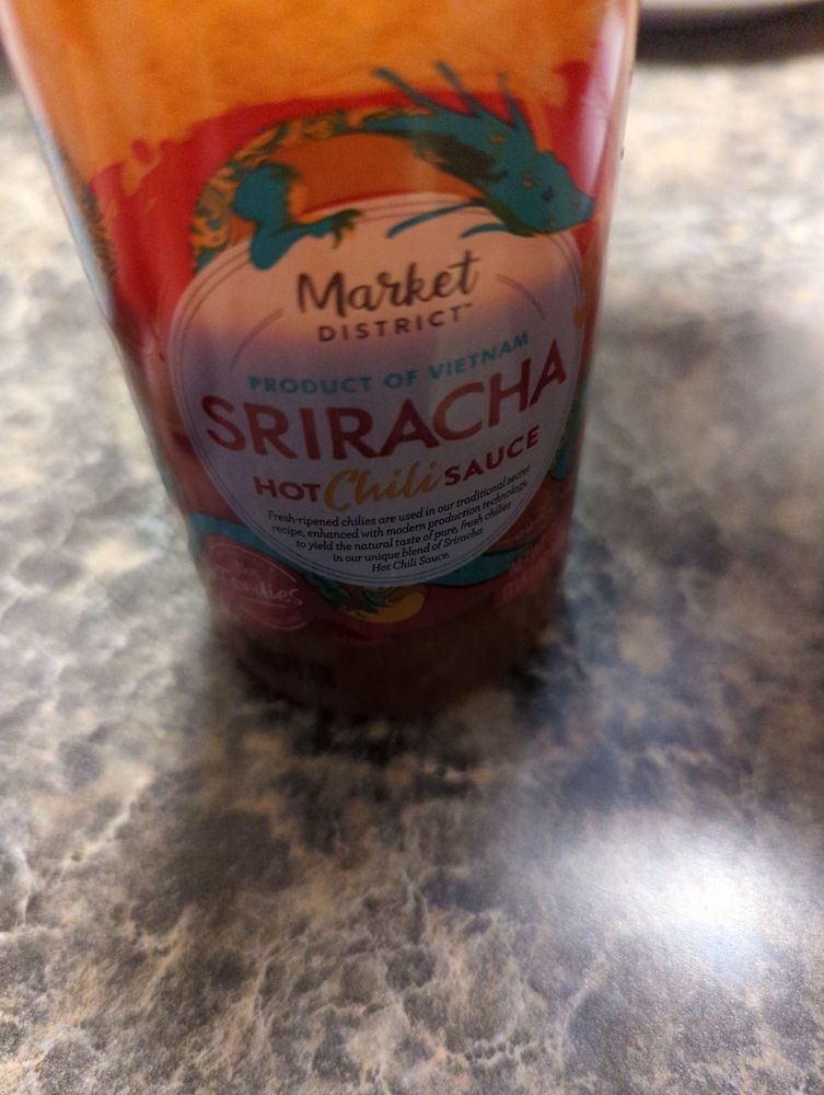Market garden Sriracha style sauce bottle