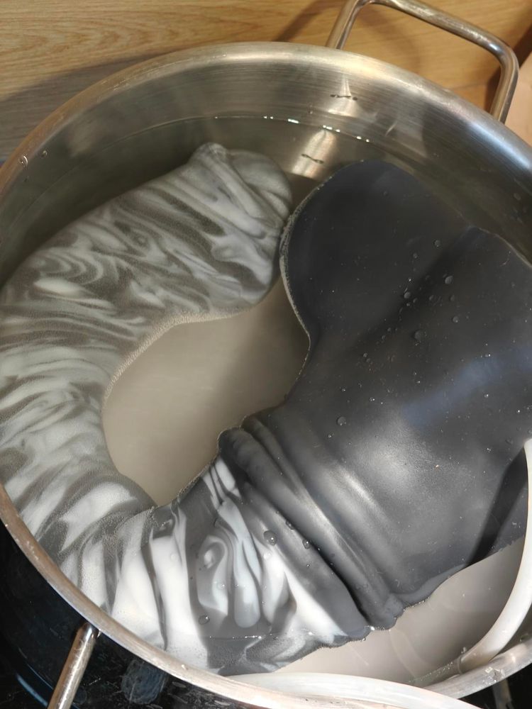 Big horse dildo in pot with hot water