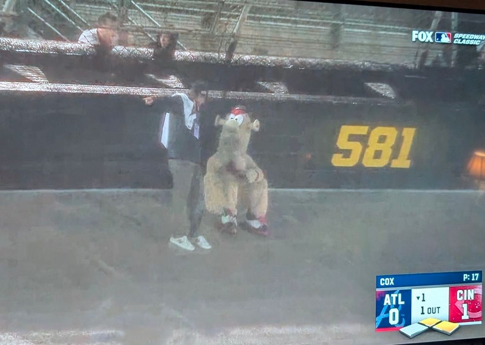 Blooper sitting naked on the track