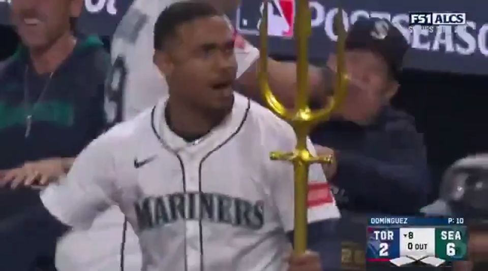 Julio on the field with the trident