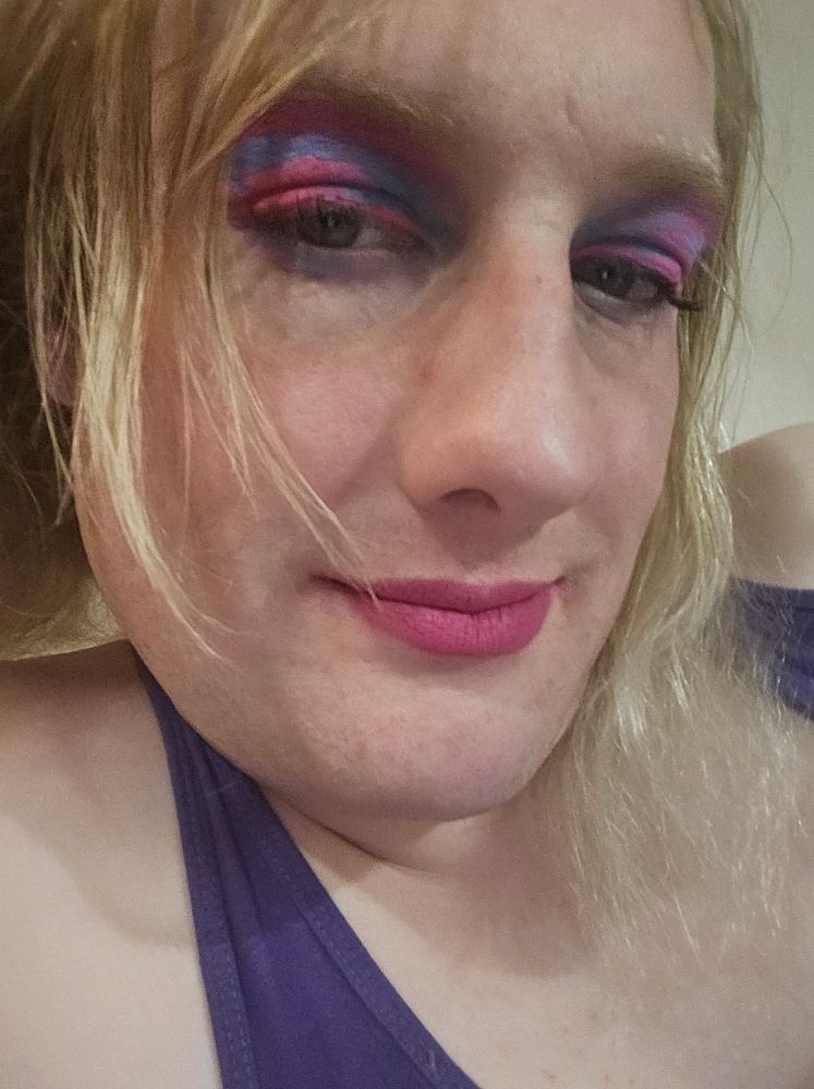 Image of blonde woman with blue, pink and purple blended eyeshadow