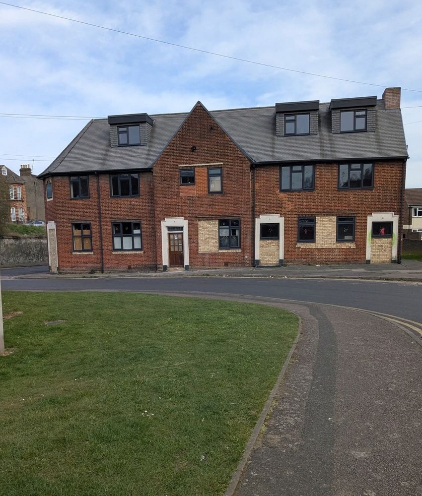 Former Shipwrights Arms in Chatham. Not the multicoloured brickwork in former windows and doors....