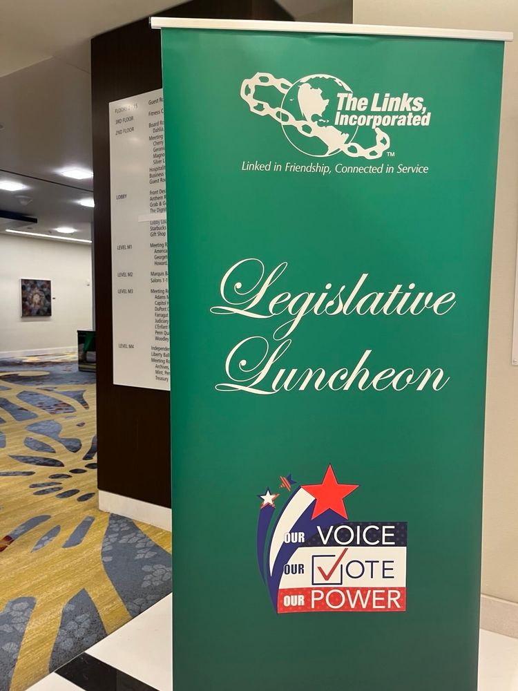 Sign in green that reads Links Incorporated, legislative luncheon 