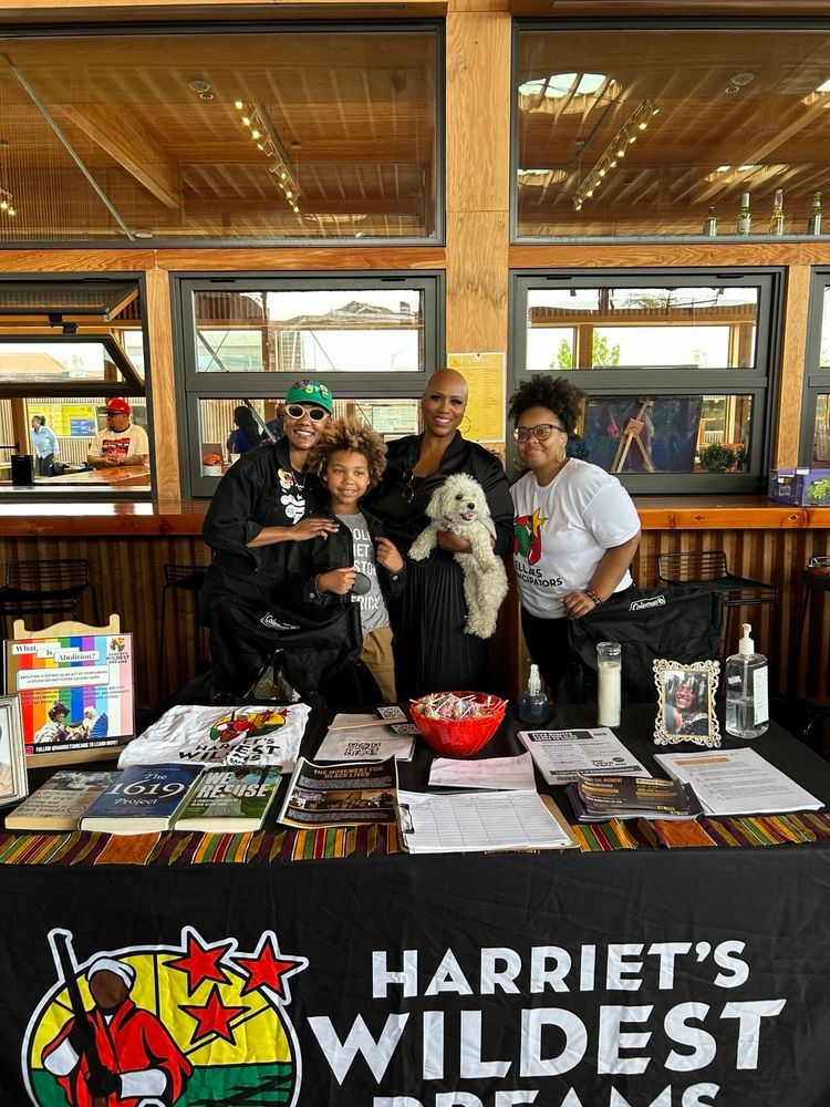 Rep Pressley poses for a photo with vendors at the State of the People DC community Day