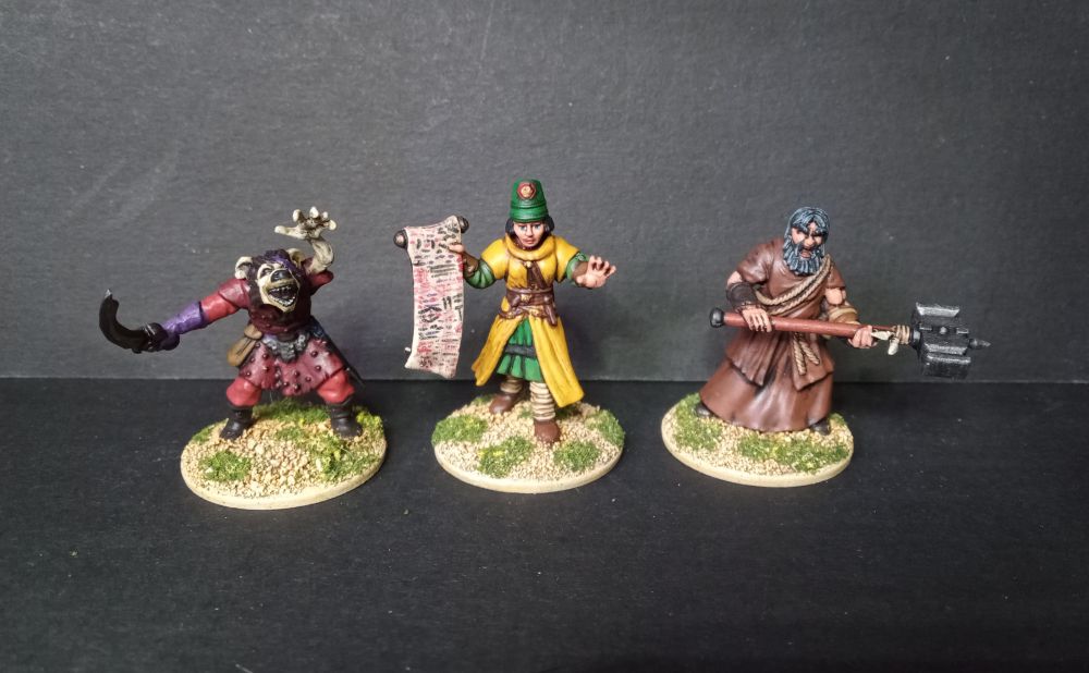 A selection of Spellcasters for Frostgrave. From left to right,  a Frostgrave gnoll head on an Oarhmark goblin body, with Frostgrave cultist arms. A Frostgrave Soldiers II body with Frostgrave Wizard II arms and head. Finally, a Frostgrave Wizard I head and body with Frostgrave Barbarian I arms. 