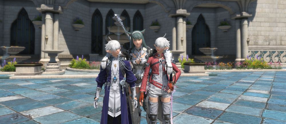 Y'dyalani with her arms around Alphinaud and Alisaie.