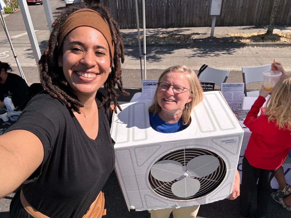 Monique Smiley posing with a community member