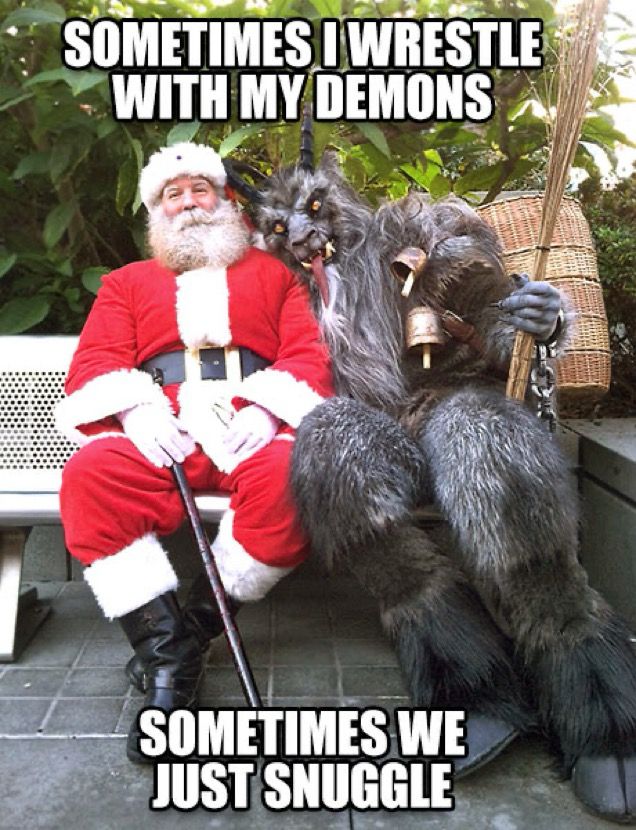 Krampus leans against Santa on a bench with the words “sometimes I wrestle with my demons. Sometimes we just snuggle”