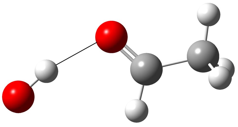 OH radical donating a hydrogen bond to acetaldehyde (ethanal).