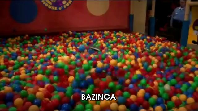 a ball pit filled with lots of colorful balls and the word bazinga on the bottom