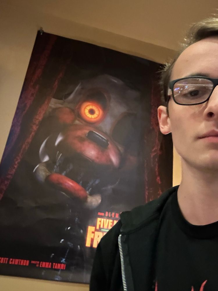 Me in front of the FNAF 2 Mangle poster prior to the screening
