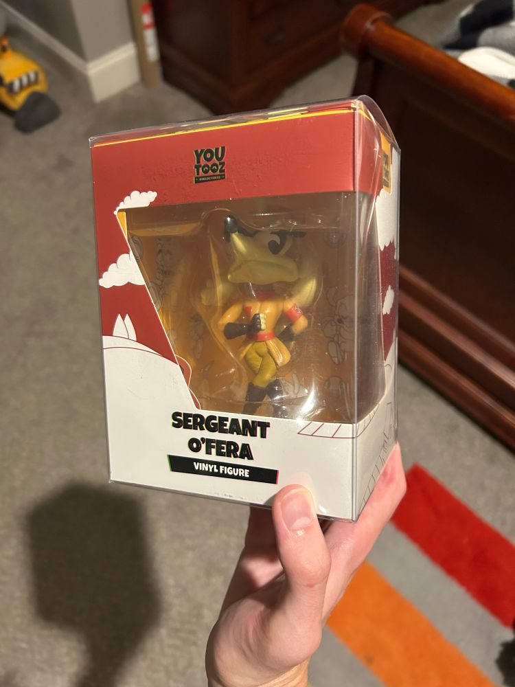 Sealed Youtooz figure of Sergeant O’Fera, a character from the video game Cuphead, being held 