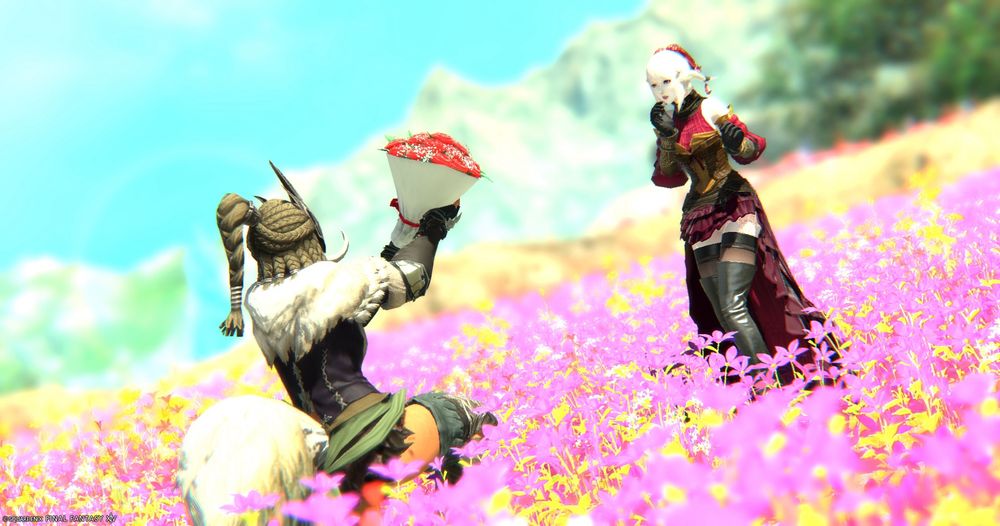 a screenshot from ffxiv. two women are in a field of pink flowers, and the one the left is offering up a bouquet of roses to the flustered one on the right. the one on the left is dressed in primal tattered furs and a boar mask, and the one on the right is a pale raen in a red dress