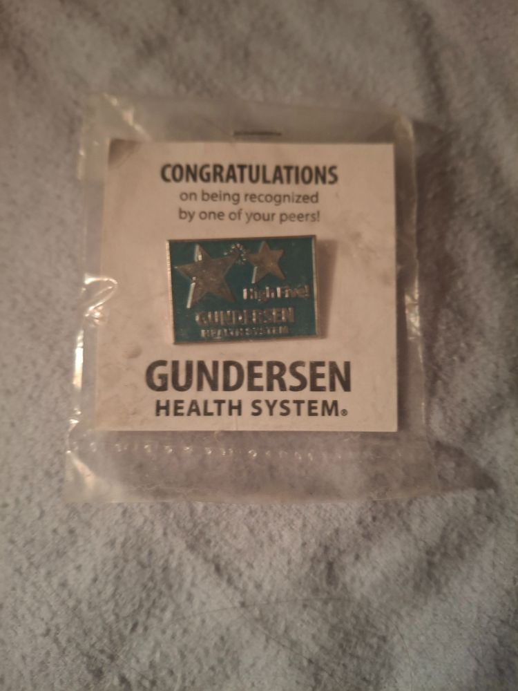 Aaron Gundersen High Five pin.