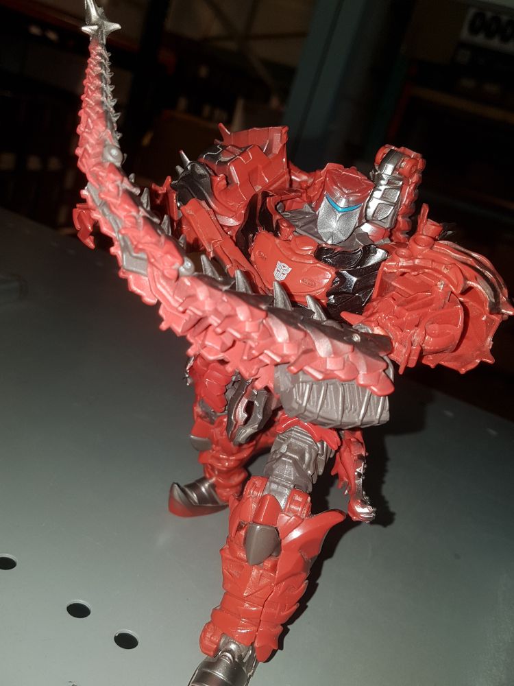Scorn with his whip/tendril arm ready to lash out at the viewer.