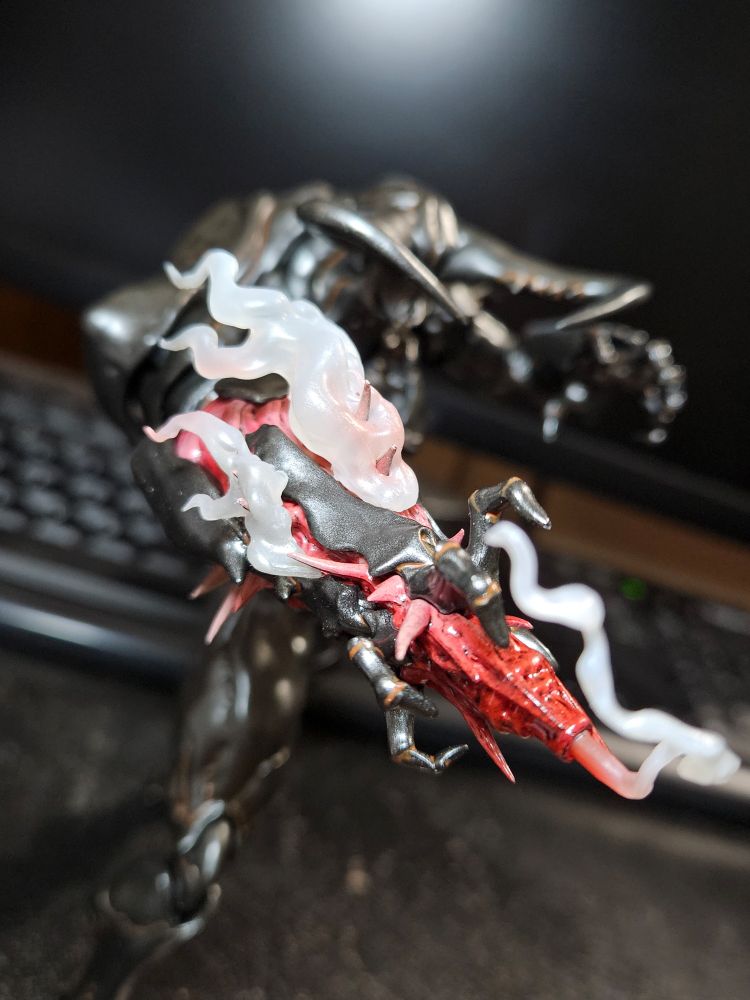 Smoke effects after he fires his arm cannon