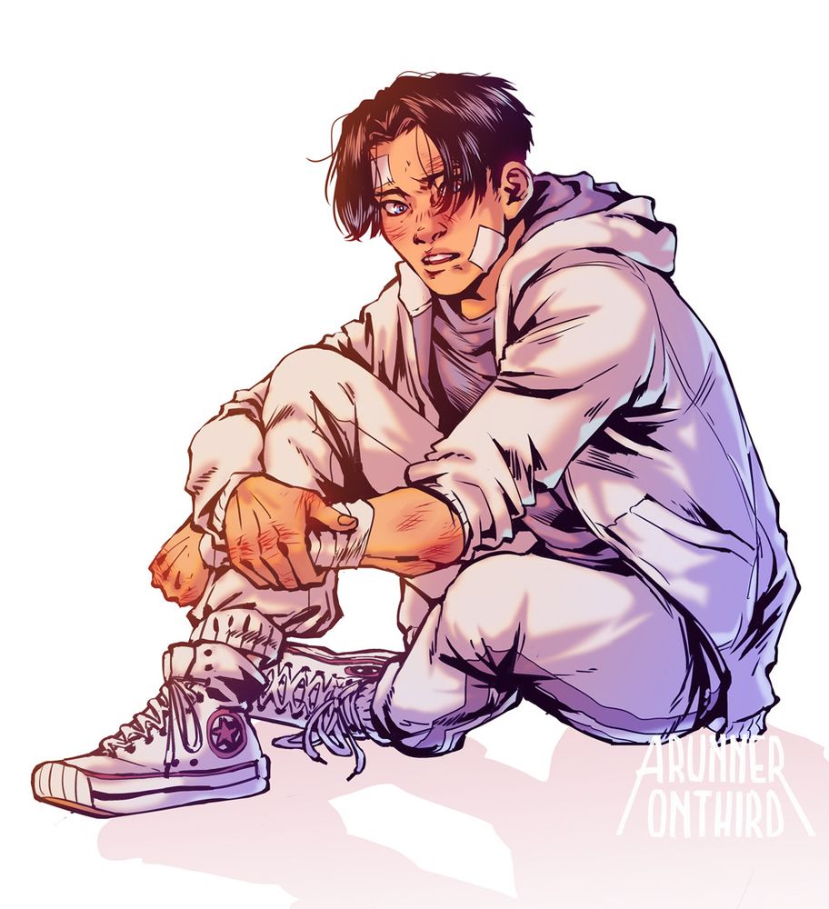 Tim drake, sitting down dressed in white, with some scratches
