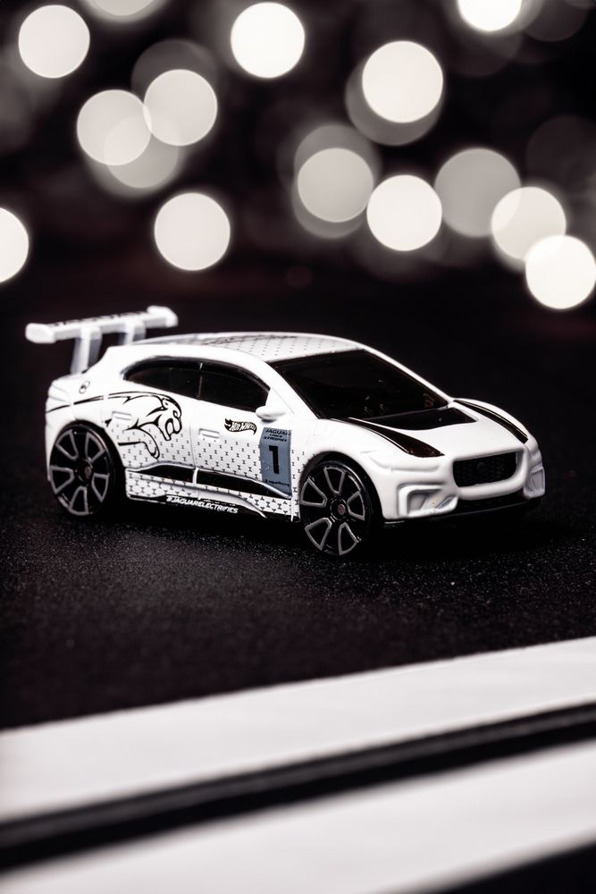 A white jaguar diecast car 