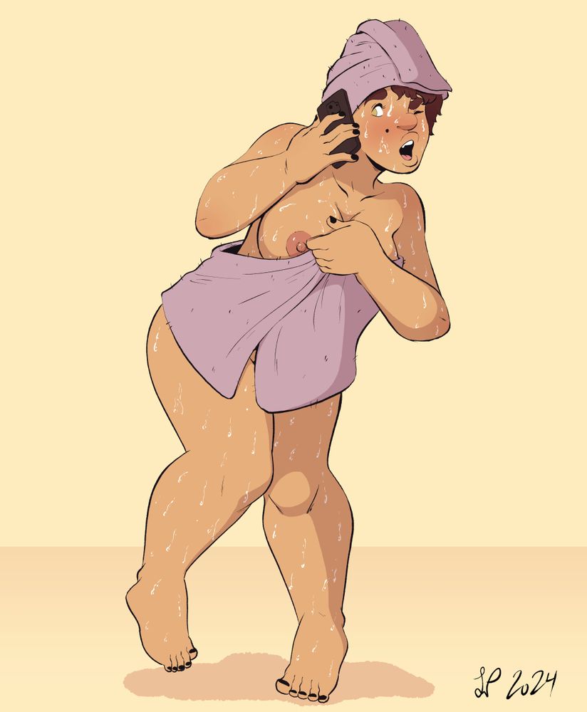 A woman in a towel answering the phone.