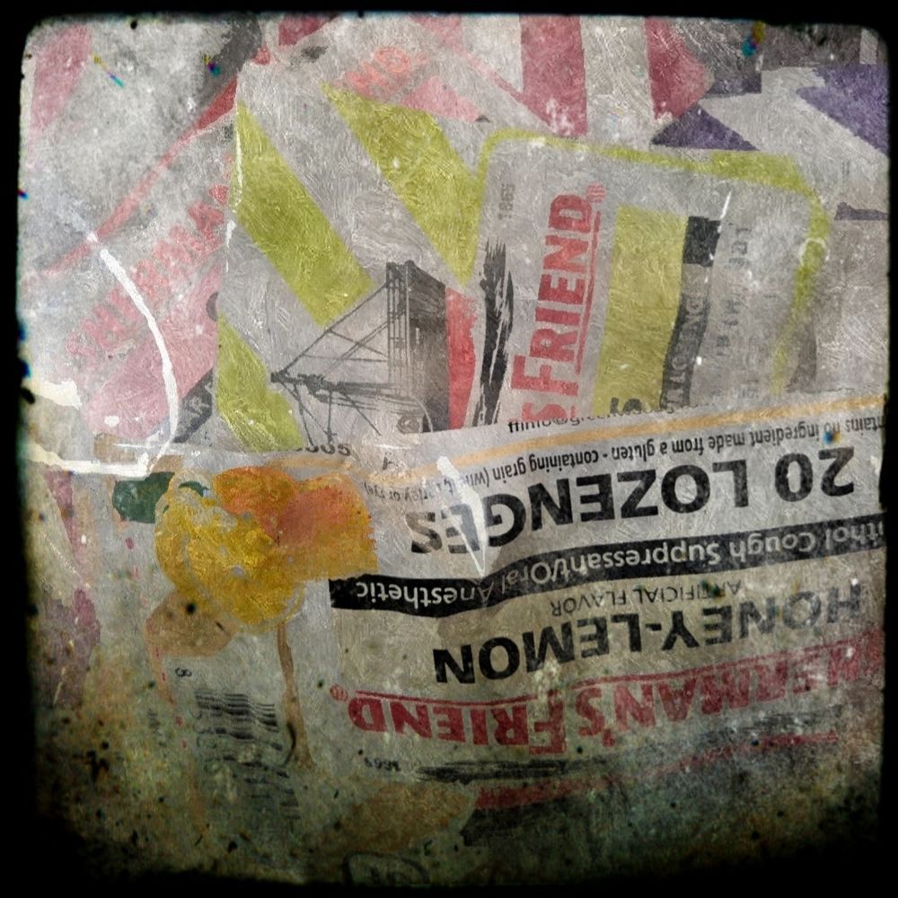 Image of ziplock bag crammed full of assorted packets of one very specific brand of sore throat lozenges. 
