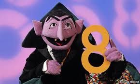 Count von Count, holding a number 8