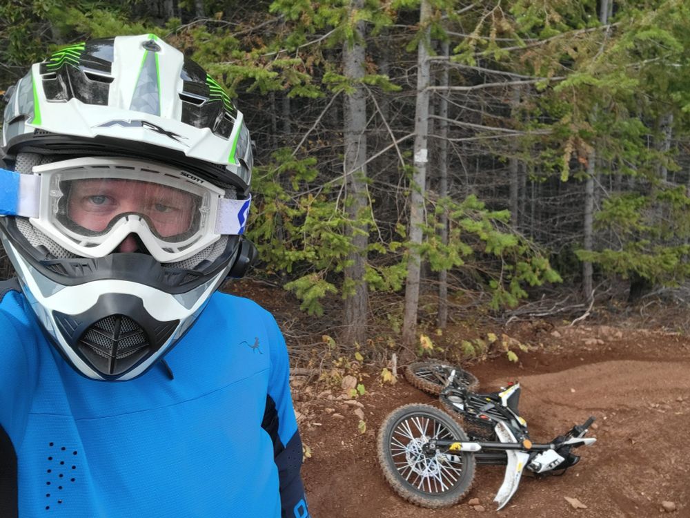 Electric motorcycle taking a dirt nap.