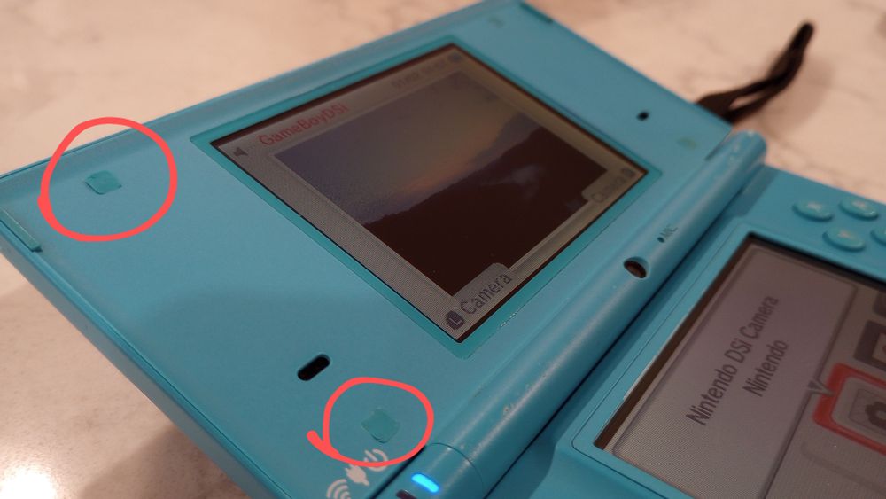 DSi screw covers, mangled
