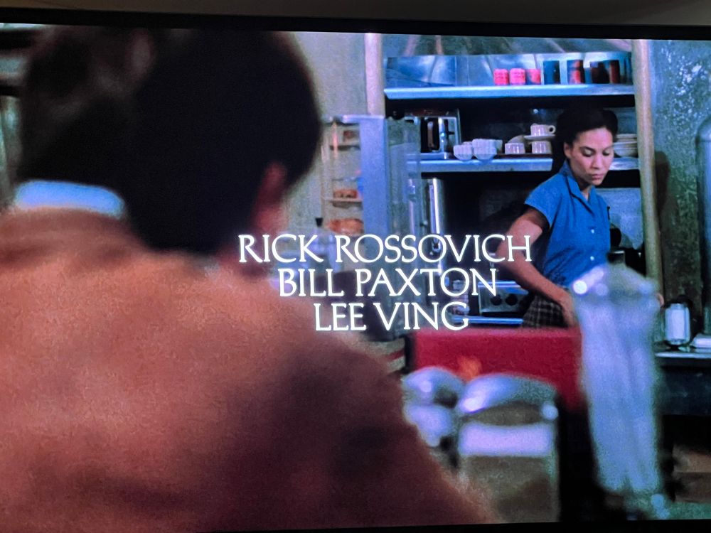 Title card from the 1984 film Streets of Fire. Title card lists cast members Rick Rossocvich, Bill Paxton and Lee Ving