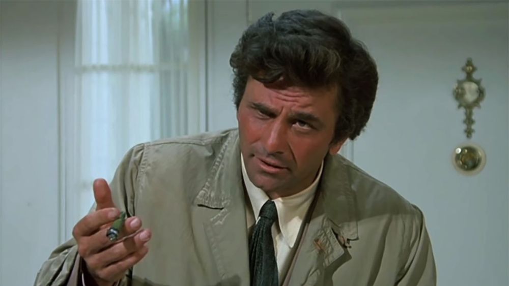 Peter Falk as Columbo, cigar in hand, an inquisitive look on his face