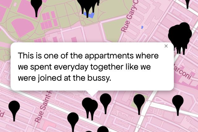 Queering The Map 
Image shows a pink map with a black pin drop on location with message that reads 
“This is one of the appartments where we spent everyday together like we were joined at the bussy.”