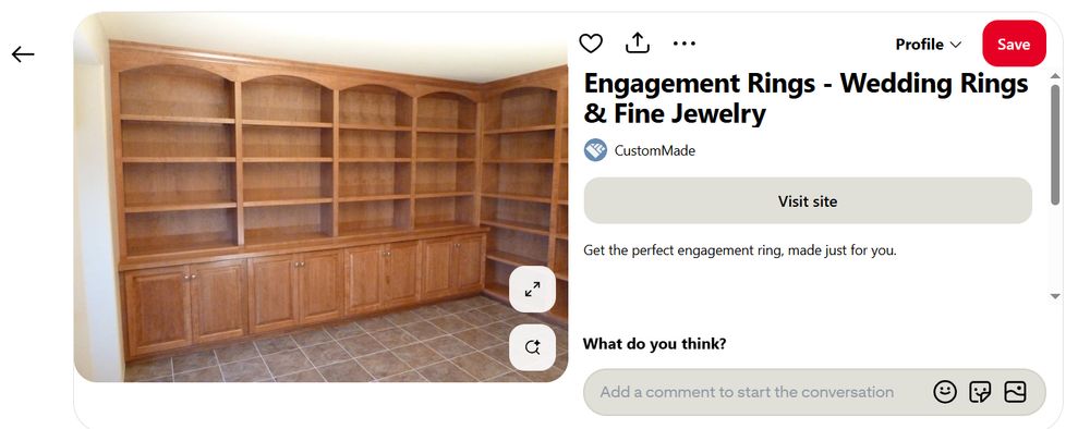Image of a set of custom made wooden library shelves stretching around a corner with the text saying "Engagement Rings"