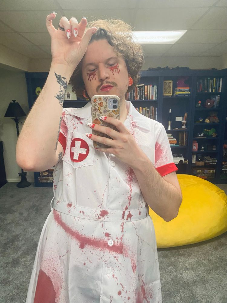 Tuck in a bloody nurse costume 
