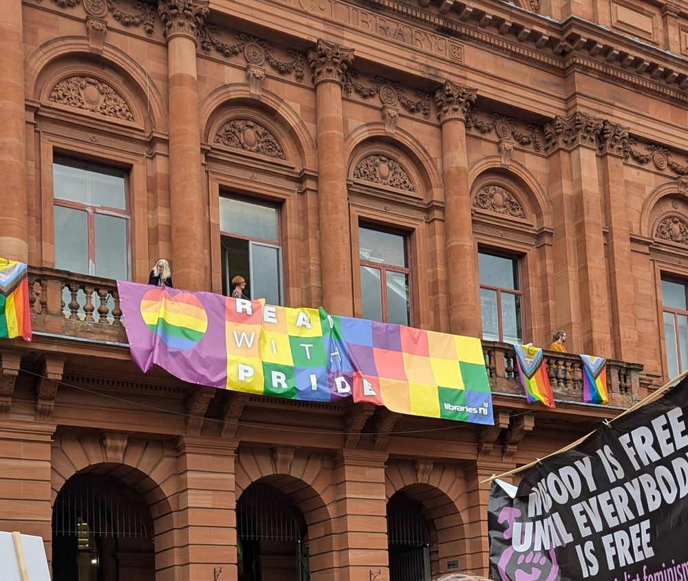 Sign on Belfast Central Library saying "read with pride".