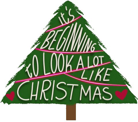 An image of a Christmas tree with writing on it that says ‘it’s beginning to look a lot like Christmas’.