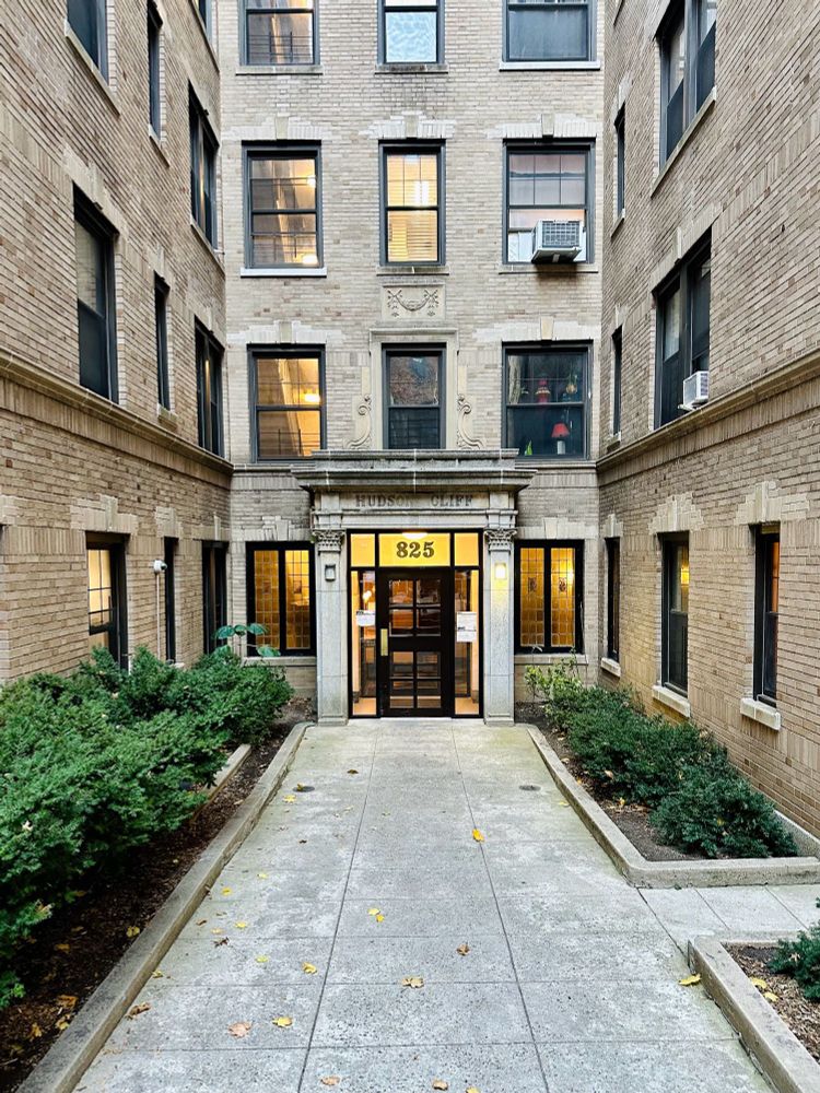 A photo of a courtyard, for the building named ‘Hudson Cliff’ 