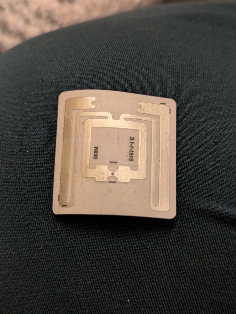 The back of the tag, showing an RFID setup.