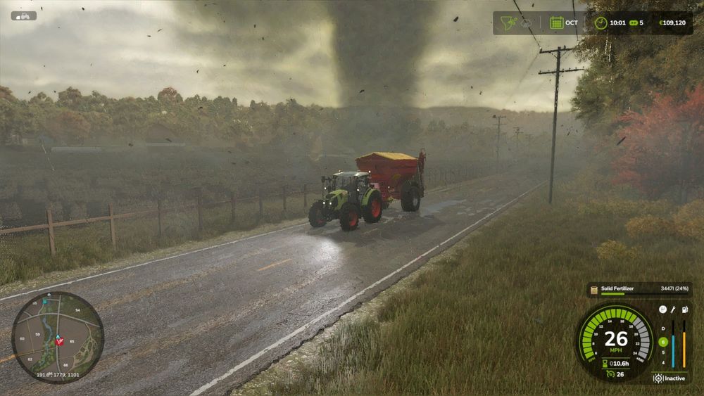 A tornado in Farming simulator 25 crossing a road while a tractor with a fertilizer casually drives through it